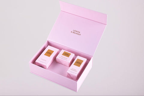 A gift box featuring a collection of Lemon & Beaker products.