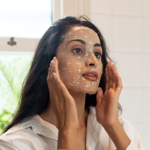 Woman wearing a Lemon & Beaker Sheet Mask